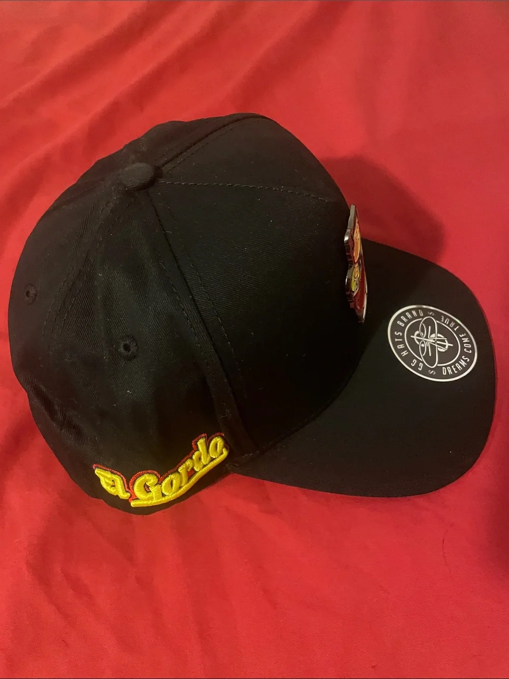 Black Trucker Hat with Gordo Metal Patch